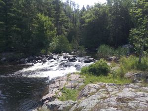 Rapids spilling out on the north side of the portage