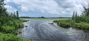 A stormy sky over North Prairie Lake from the end of the 975m portage from Indian House.