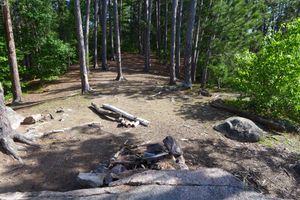 Looking into tent pad area from above fire pit