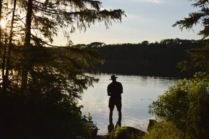 silhouette fisherman