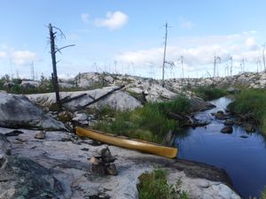 Burned down to the rock portage looking west