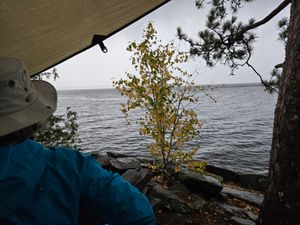 Huddling under a tarp at Campsite 141