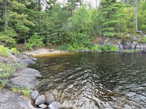 View of the beach from the rocky point at Campsite 170