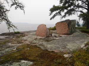 Glacial erratic boulder fire pit looking west