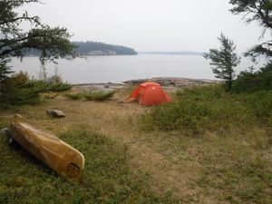 Grassy campsite looking west