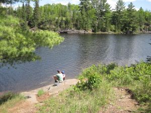 Jen and Joey fishing from Camp - Jordan Lake