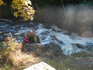 Family photo by Kawishiwi River waterfall